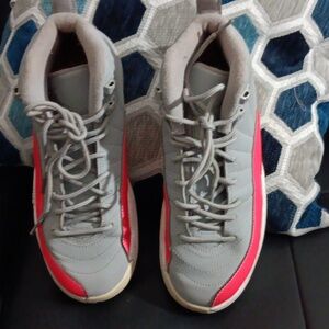 Women's jordan 12 grey and pink mids size. 6.5
